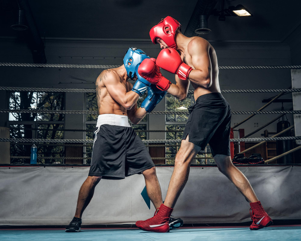 two-muscular-boxers-have-competition-ring-they-are-wearing-helmets-gloves